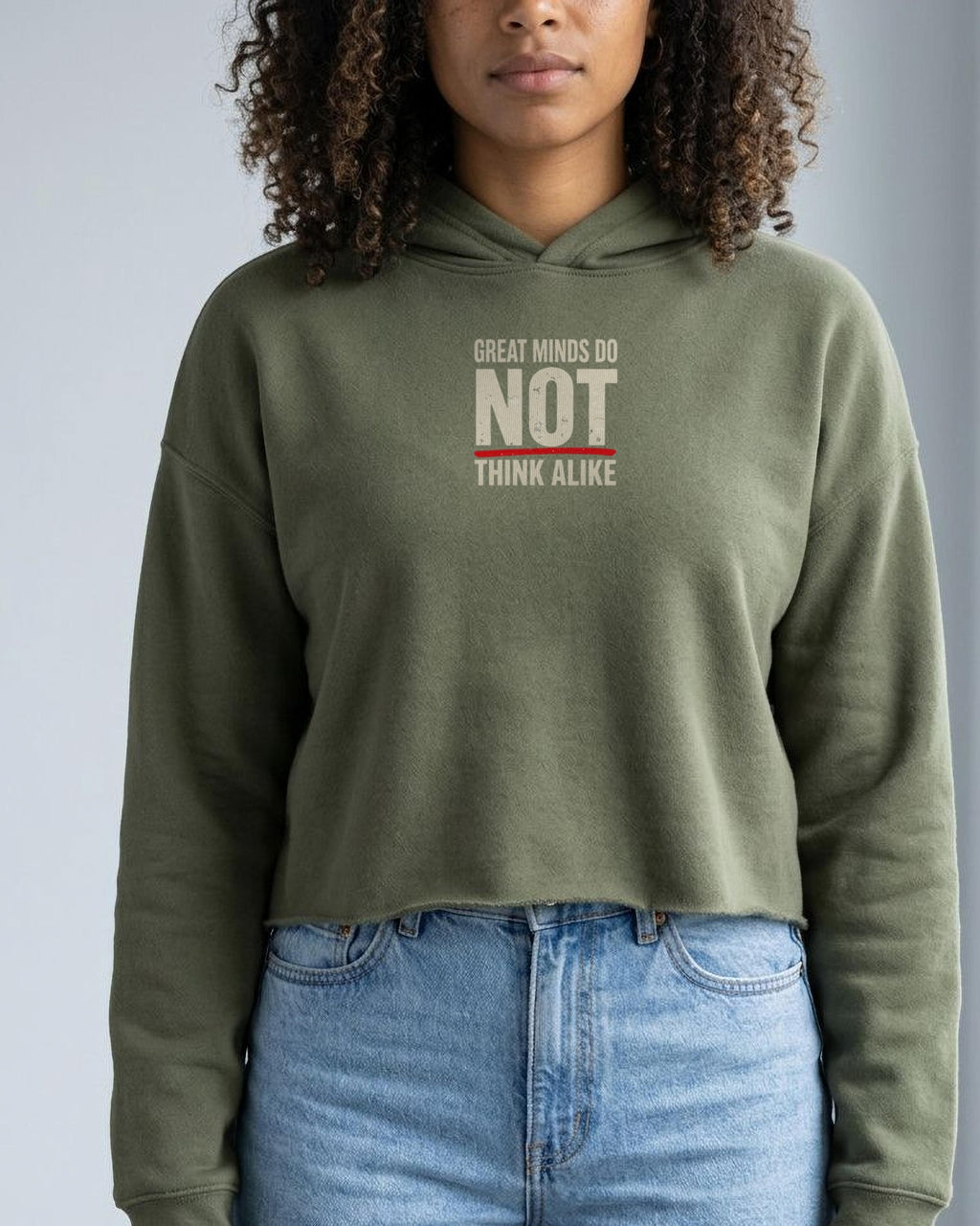 Great Minds Do NOT Think Alike printed crop hoodie in Military Green, worn, front view showing the chest print