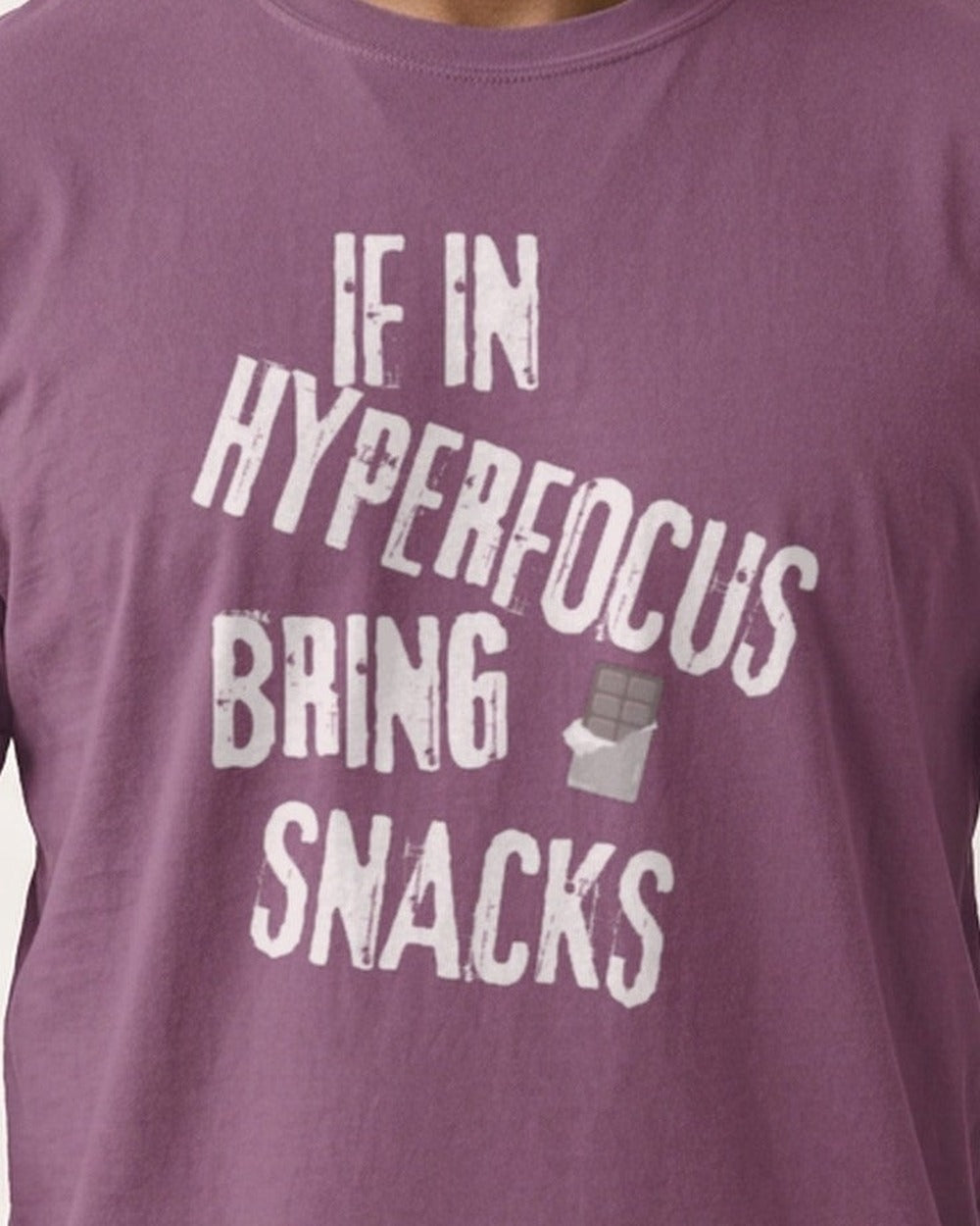 Close-up of the "Hyperfocus ... Bring Snacks." slogan