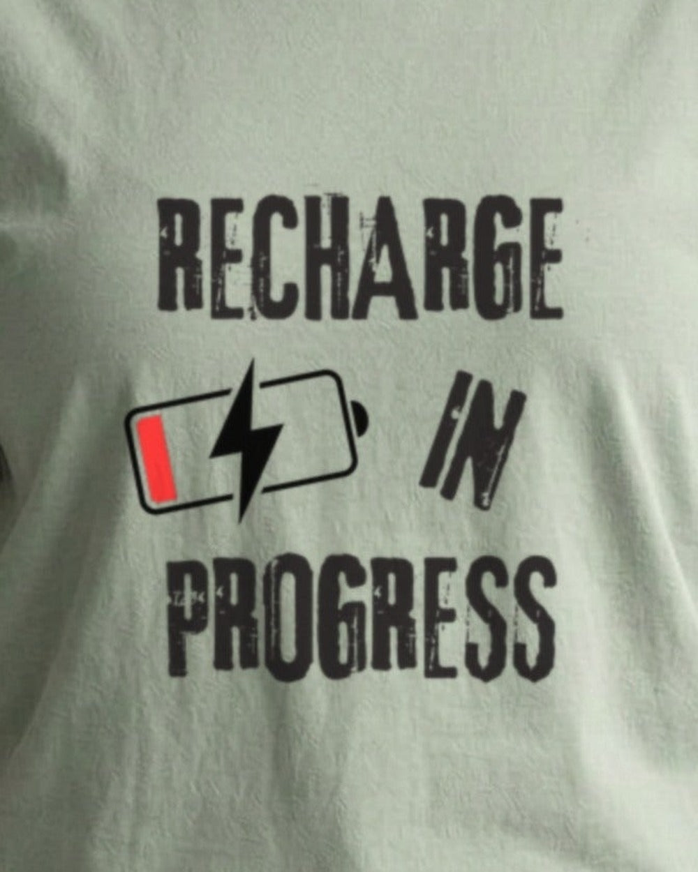 Close-up of the "Recharge in Progress" slogan