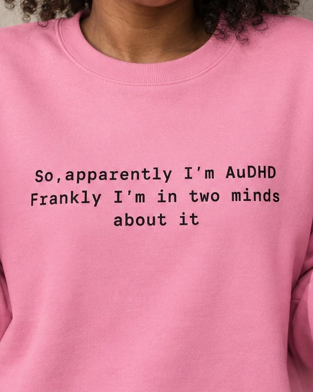 Close-up of the "AuDHD Two Minds About It" slogan