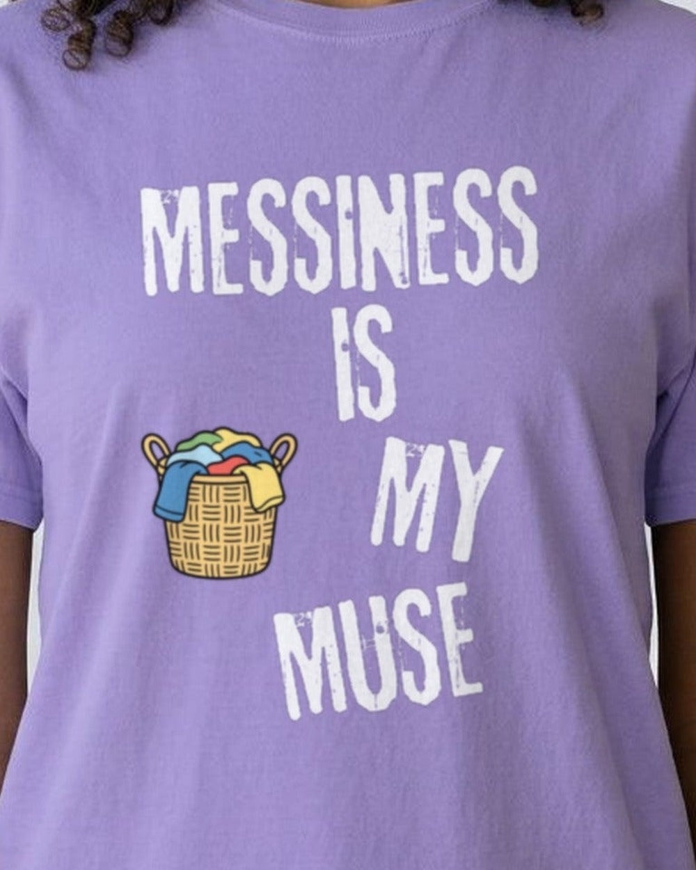 Close-up of the "Messiness is My Muse" slogan