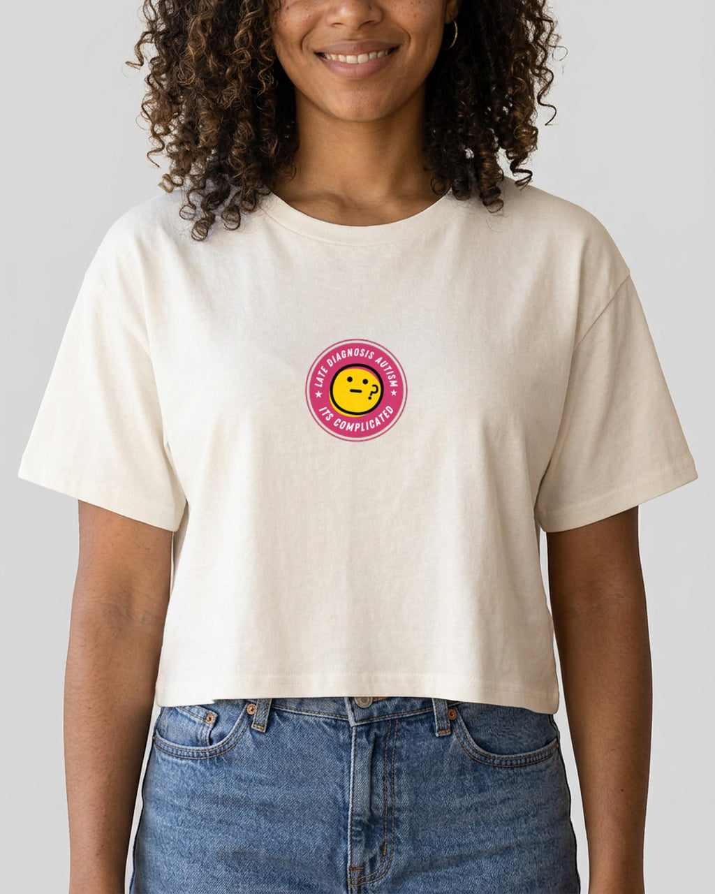 It's Complicated Autism embroidered crop top in Ecru, worn, full view