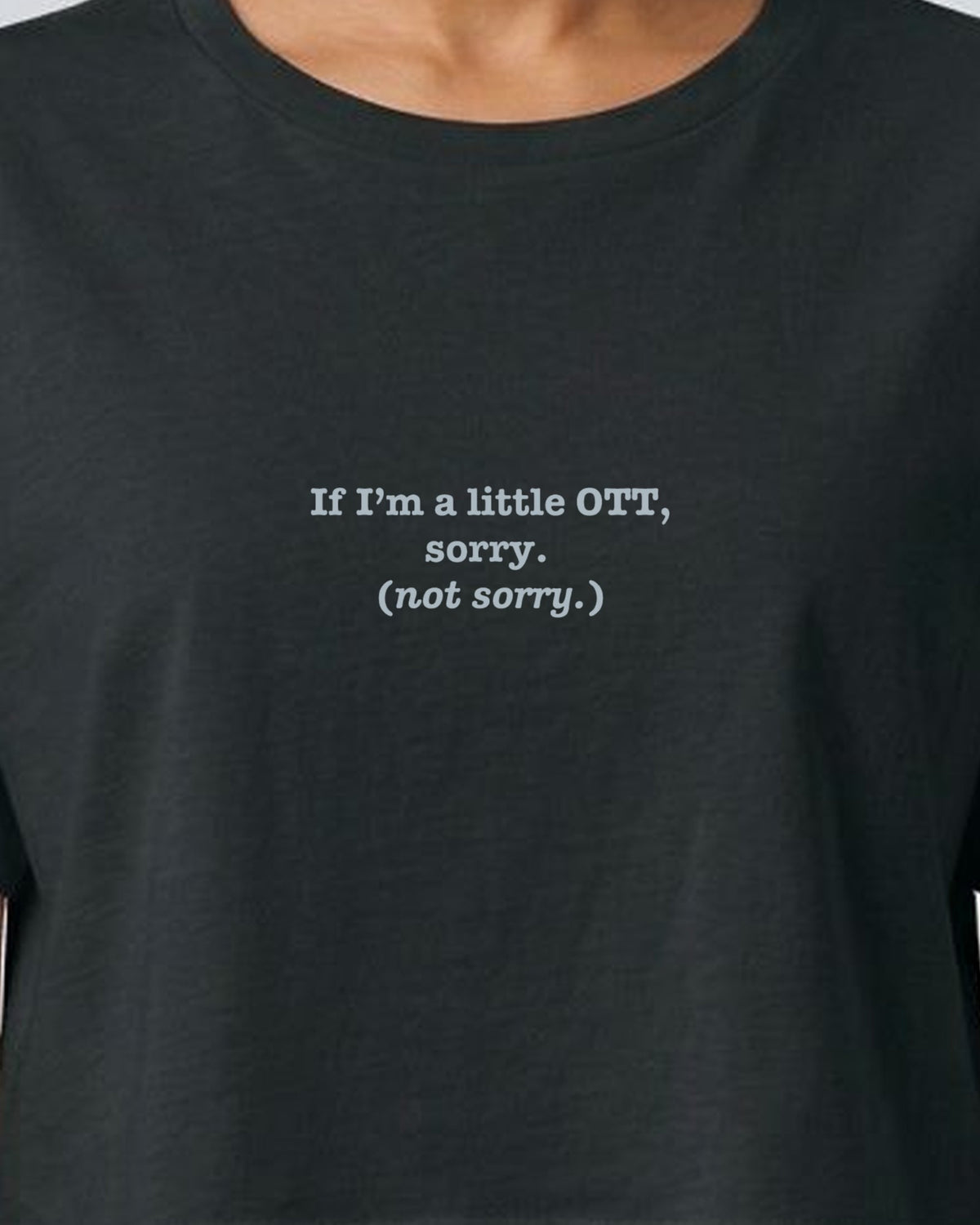 OTT? Sorry (Not Sorry) embroidered crop top in Black, worn, close-up of the embroidery