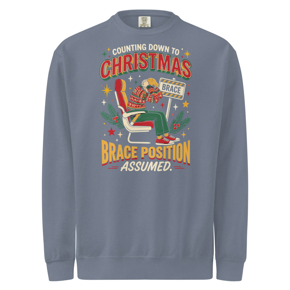 Christmas Countdown: Brace Position sweatshirt in Blue Jean, front view of the printed design