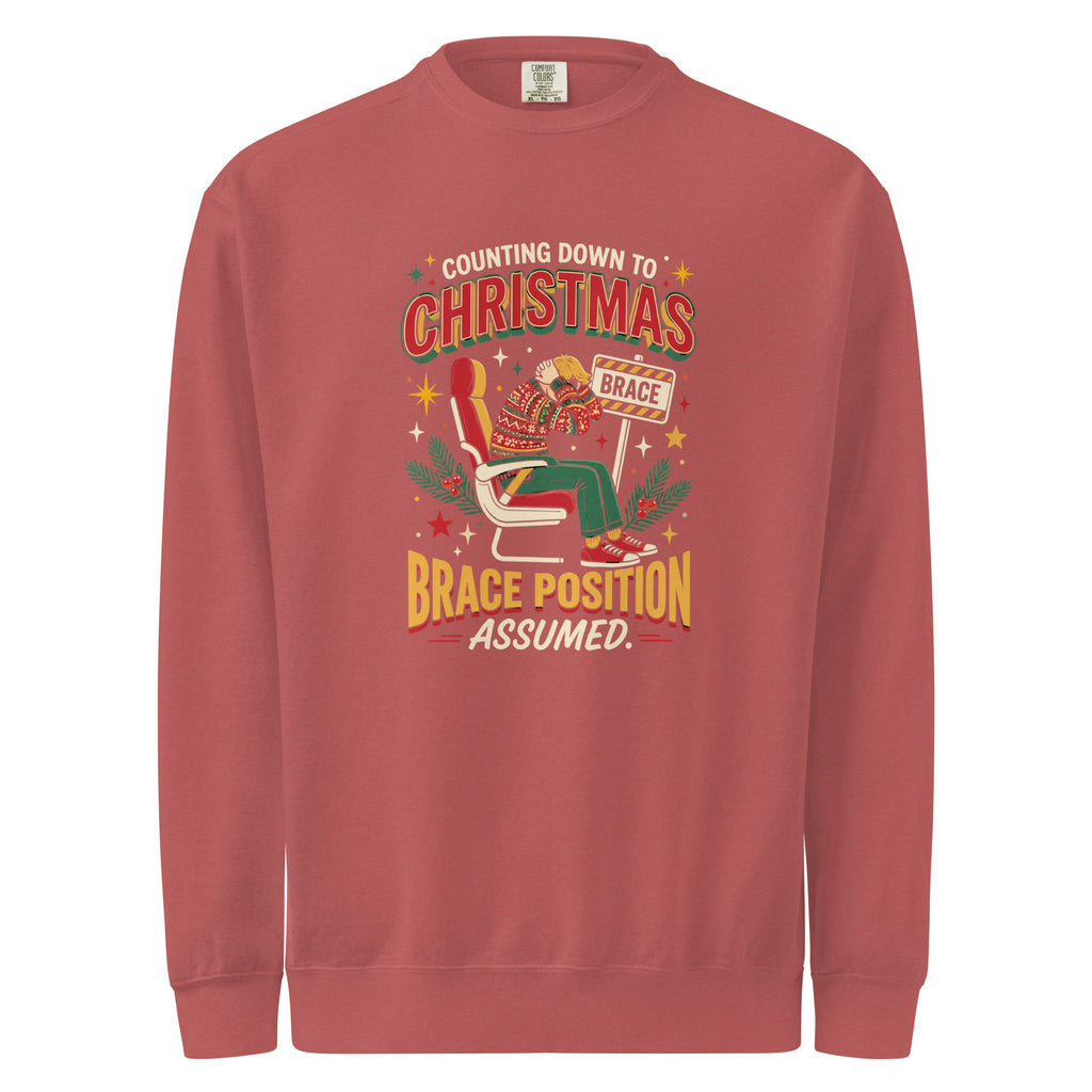Christmas Countdown: Brace Position sweatshirt in Crimson, front view of the printed design