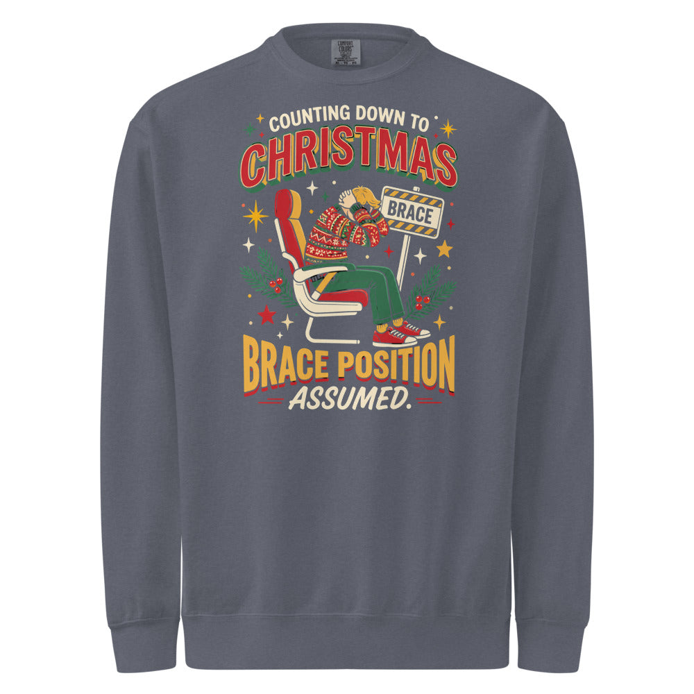 Christmas Countdown: Brace Position sweatshirt in Denim, front view of the printed design