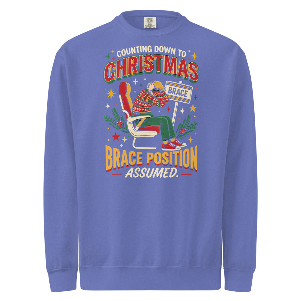 Christmas Countdown: Brace Position sweatshirt in Flo Blue, front view of the printed design