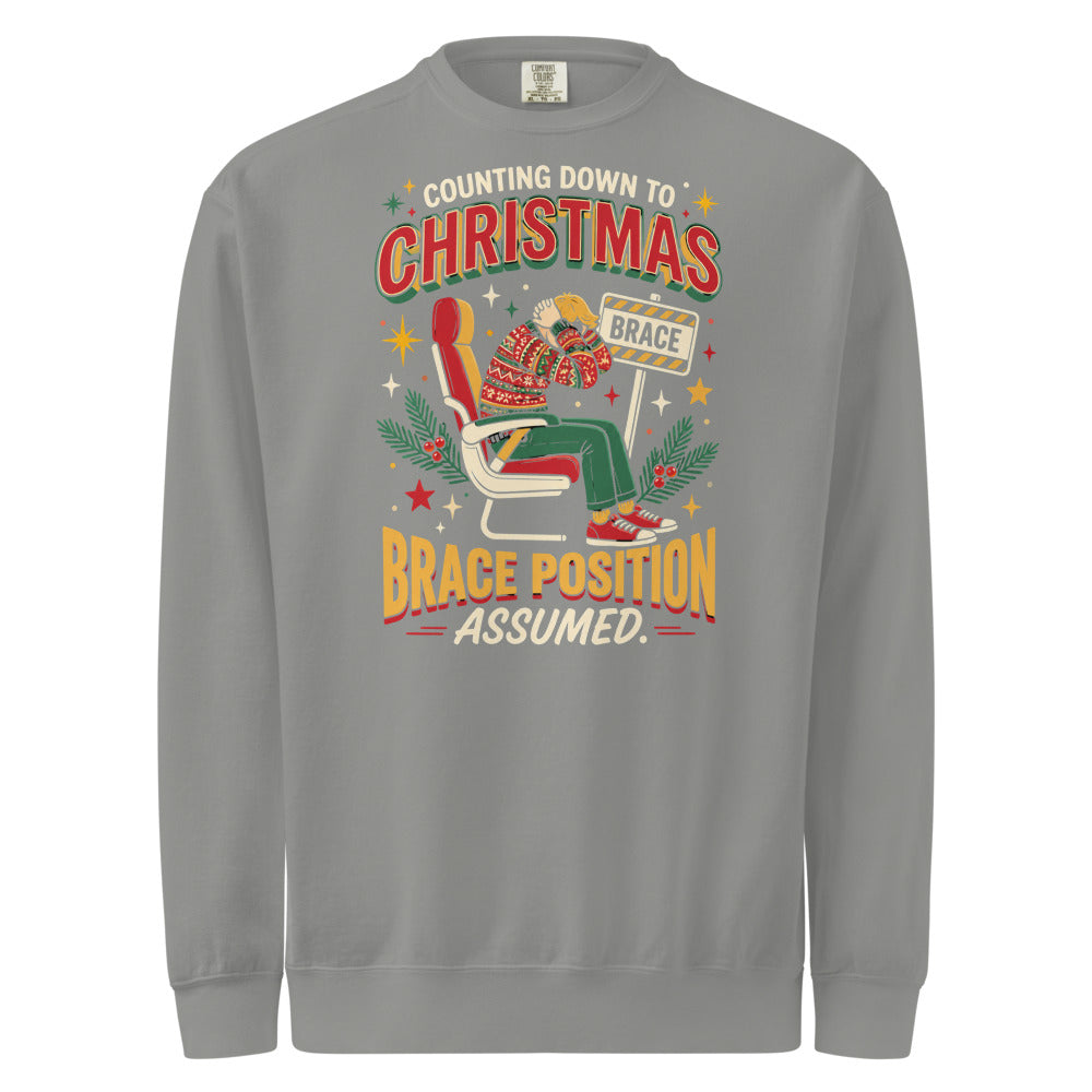 Christmas Countdown: Brace Position sweatshirt in Grey, front view of the printed design
