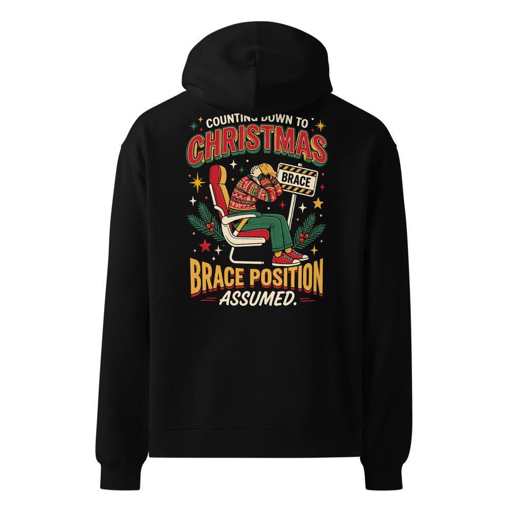 Brace for Christmas! oversized hoodie in Black, back view, large back print