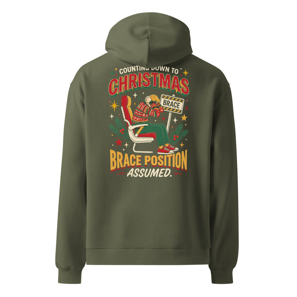 Brace for Christmas! oversized hoodie in Cypress, back view, large back print