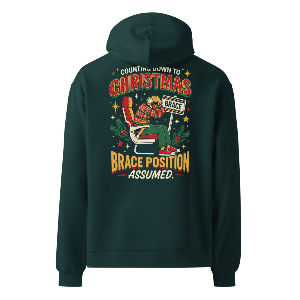 Brace for Christmas! oversized hoodie in Pine Green, back view, large back print