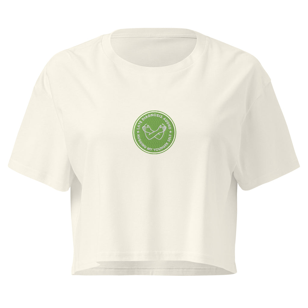 Hugging ... AuDHD | Women’s Crop Top | Late Diagnosis womens-crop-top-natural-front-69f66ae694809 Crop Top