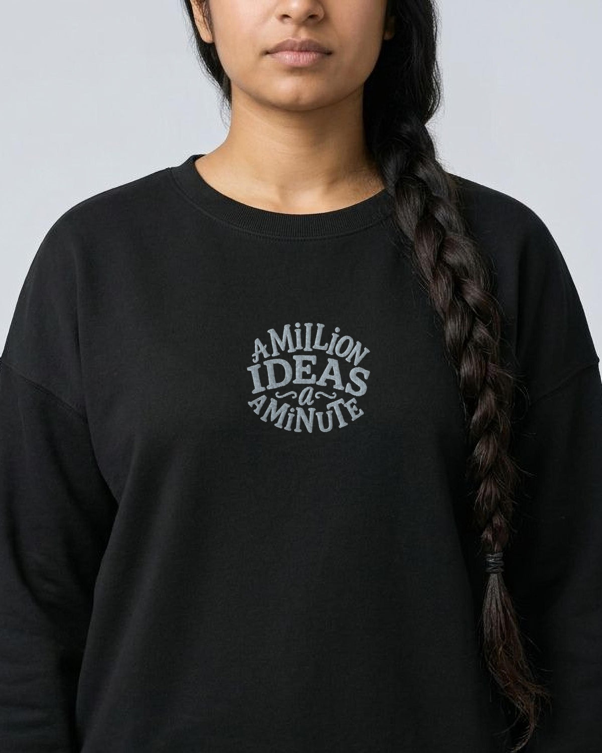 A Million Ideas embroidered women's organic sweatshirt in Black, worn