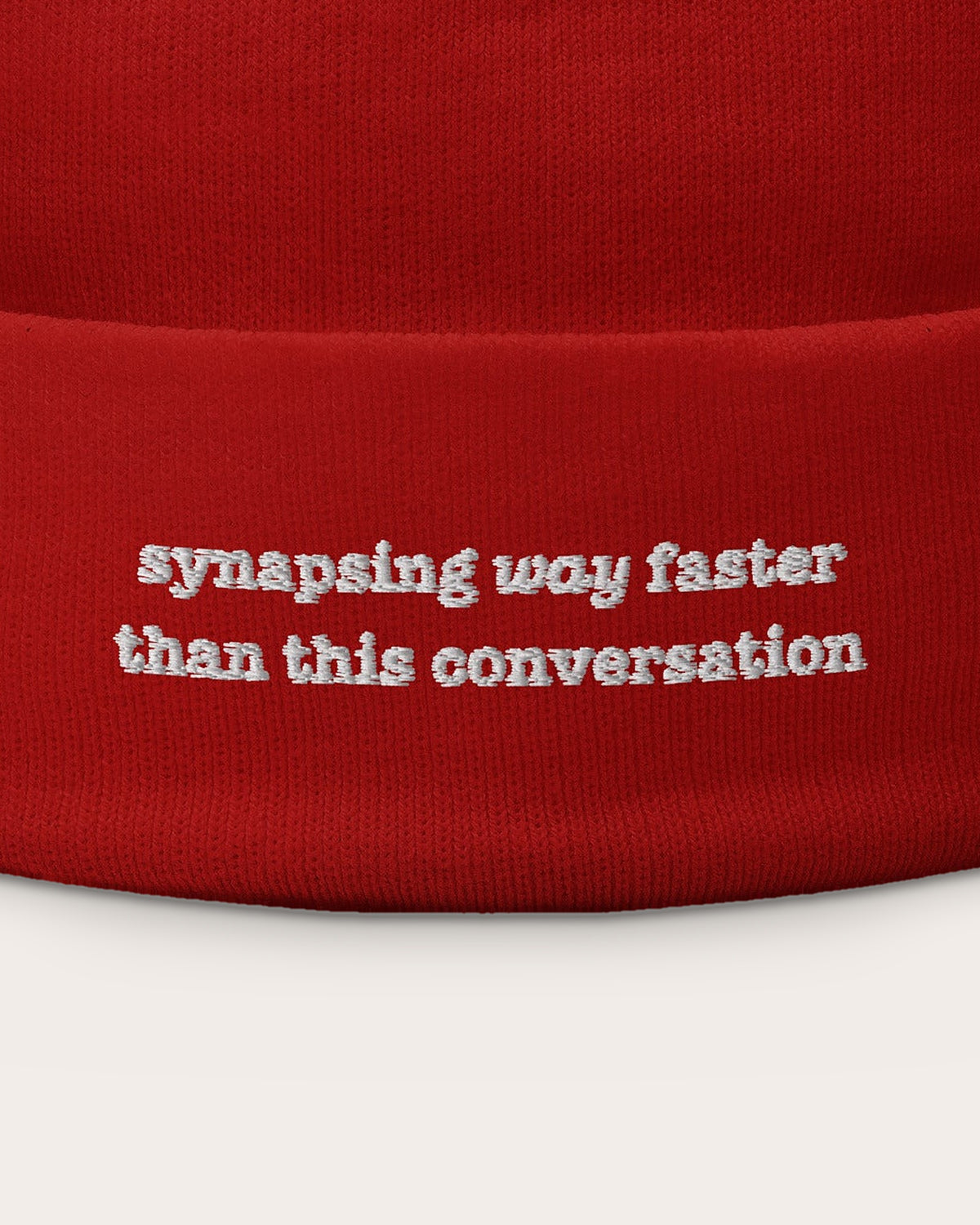 Synapsing Way Faster (beanie) embroidered dad hat in Red, close-up of the embroidery