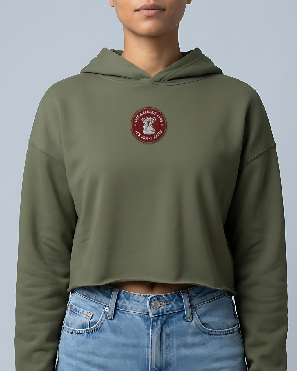It's Complicated (ADHD) embroidered crop hoodie in Military Green, worn, front view