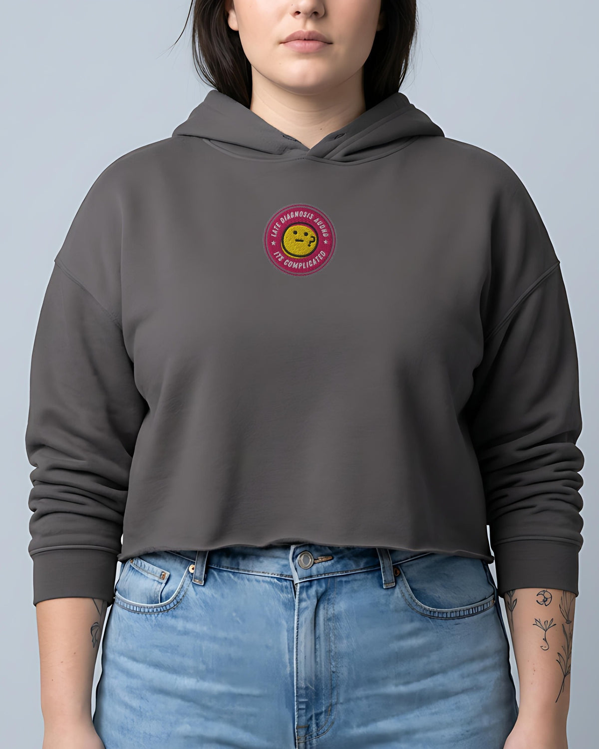 It's Complicated (AuDHD) embroidered crop hoodie in Storm, worn, front view