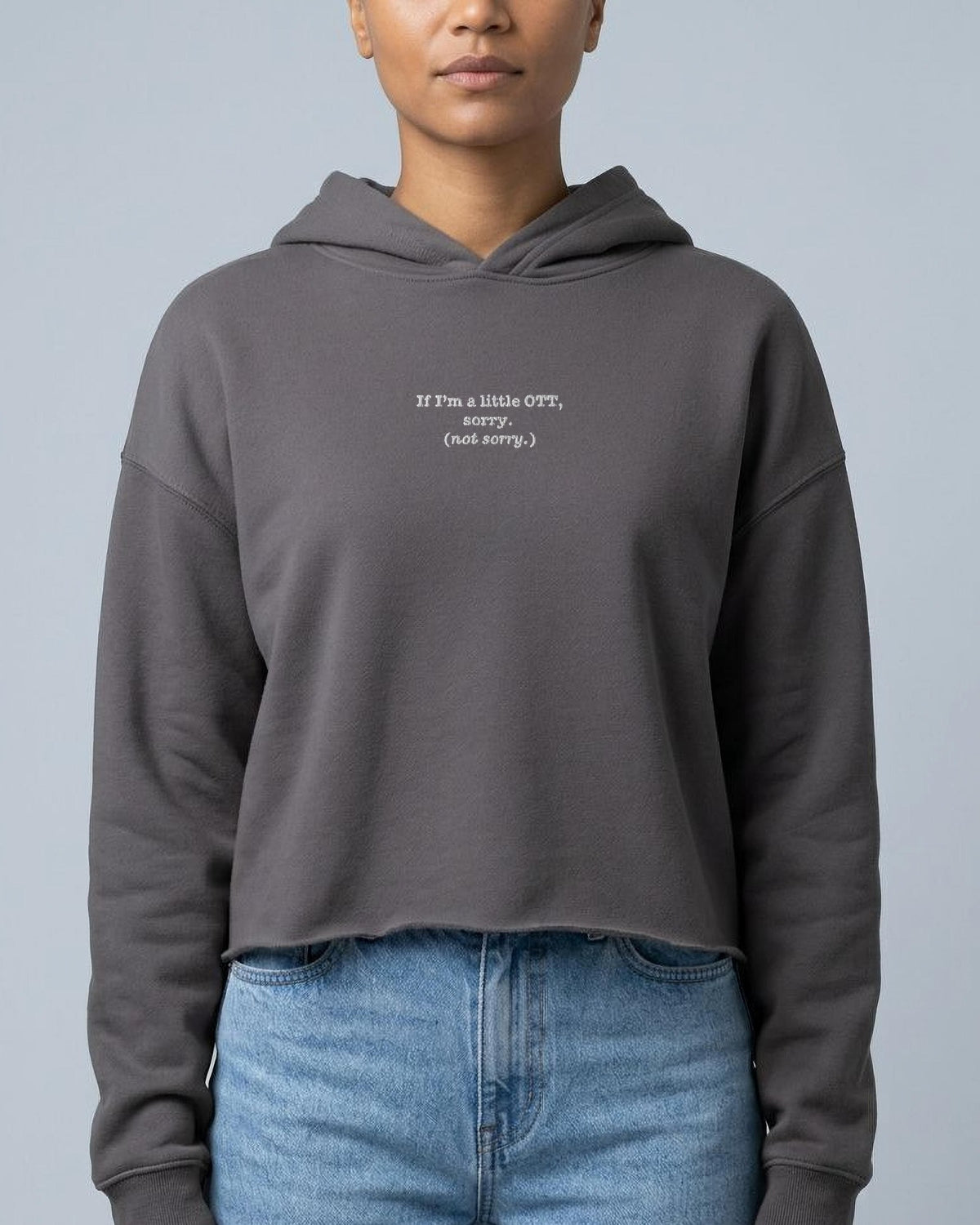 OTT? Sorry (Not Sorry) embroidered crop hoodie in Storm, worn, front view