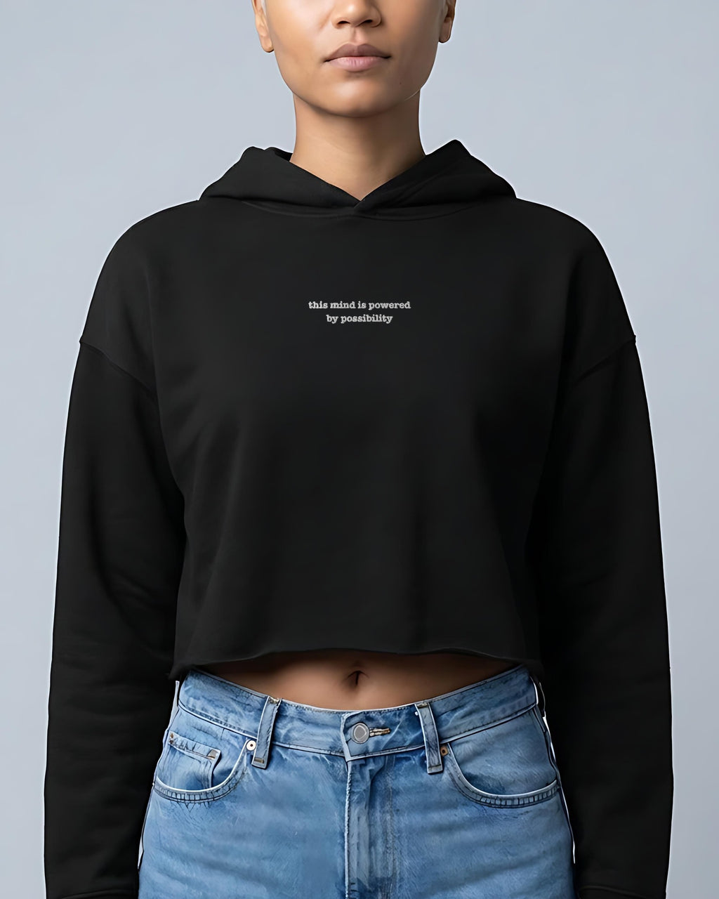 Powered by Possibility embroidered crop hoodie in Black, worn, front view