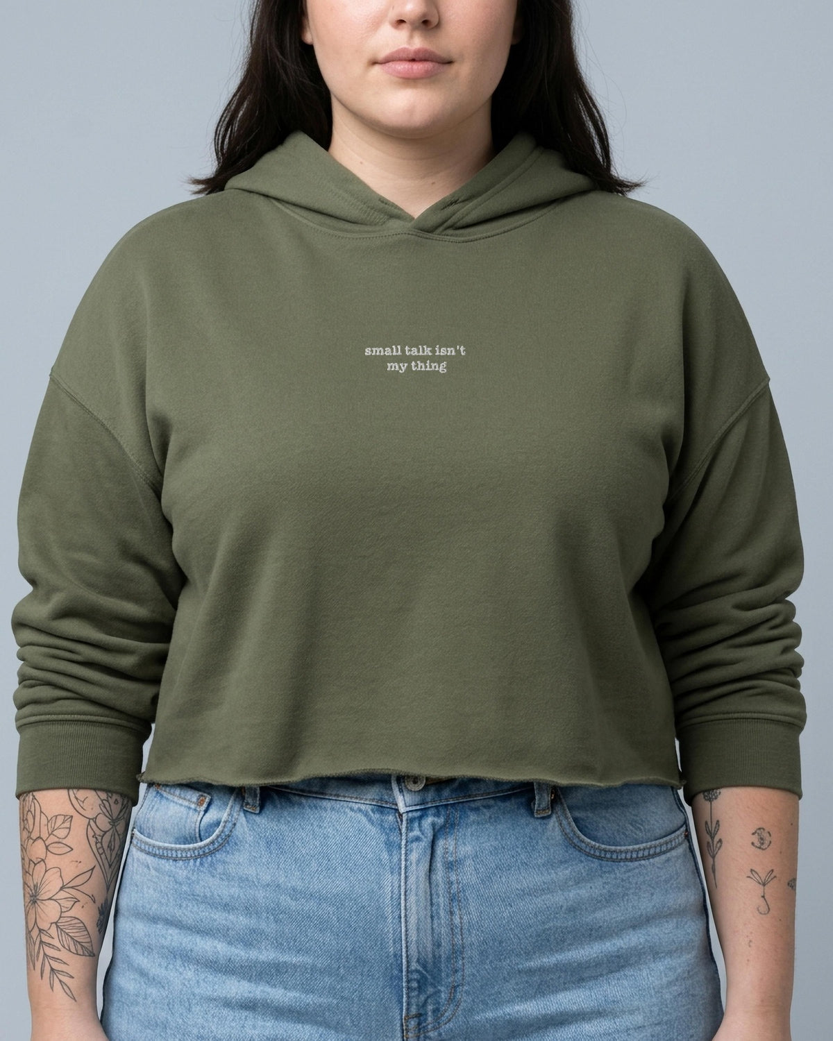 Small Talk Isn't My Thing embroidered crop hoodie in Military Green, worn, front view