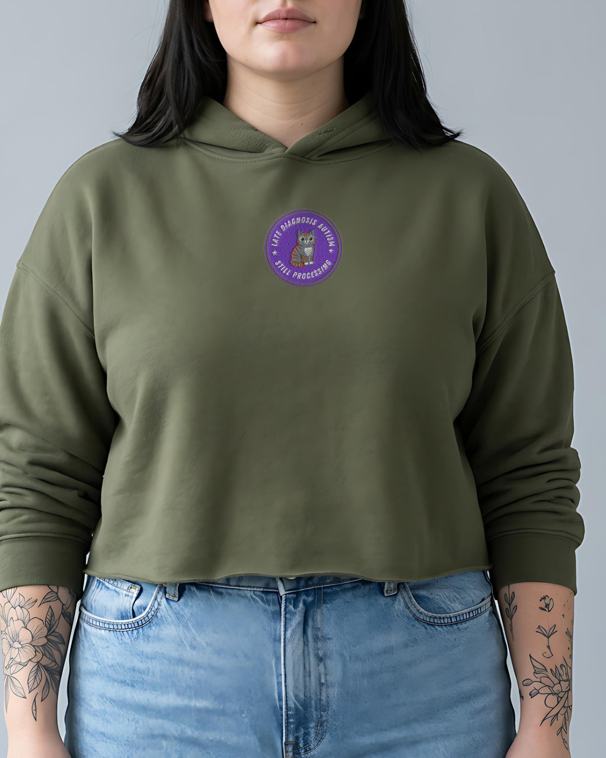 Still Processing ... Autism embroidered crop hoodie in Military Green, worn, front view