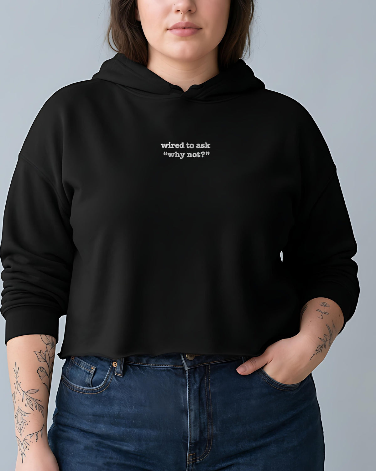 Wired to Ask Why Not? embroidered crop hoodie in Black, worn, front view