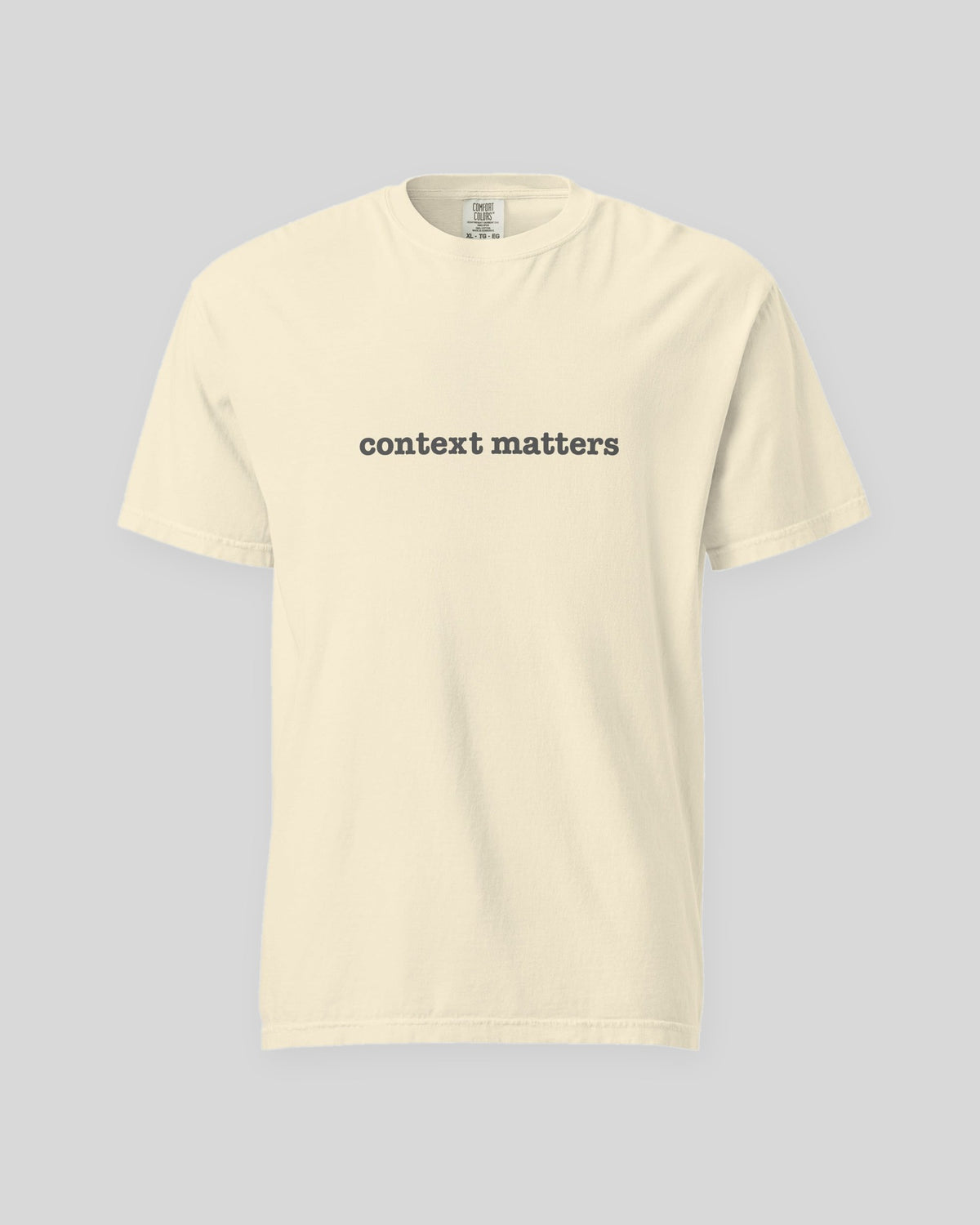 Context Matters garment-dyed tee in Ivory, laid flat