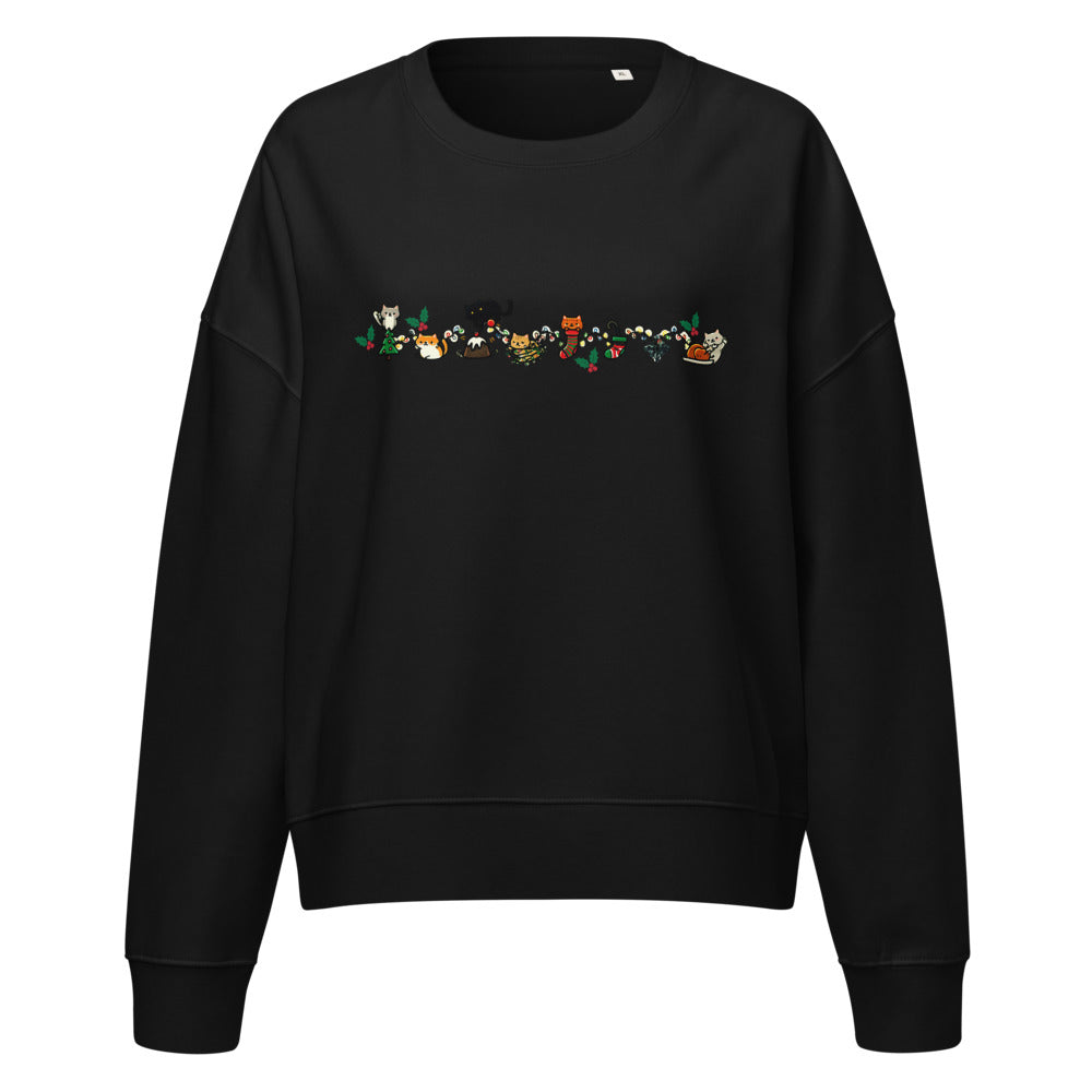Cozy Catty Christmas women's organic sweatshirt in Black, front view