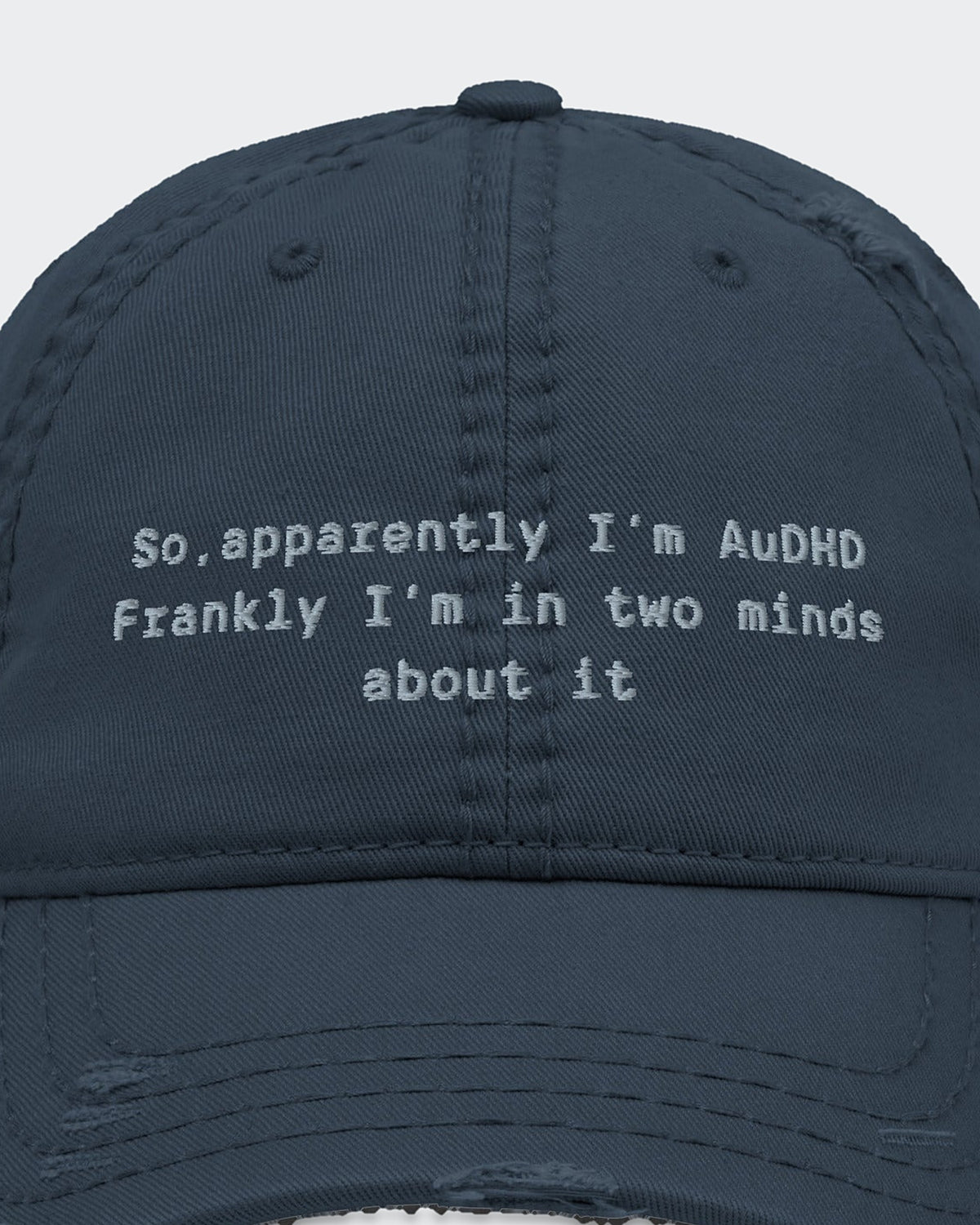 Apparently AuDHD (dad hat) embroidered dad hat in Navy, close-up of the embroidery