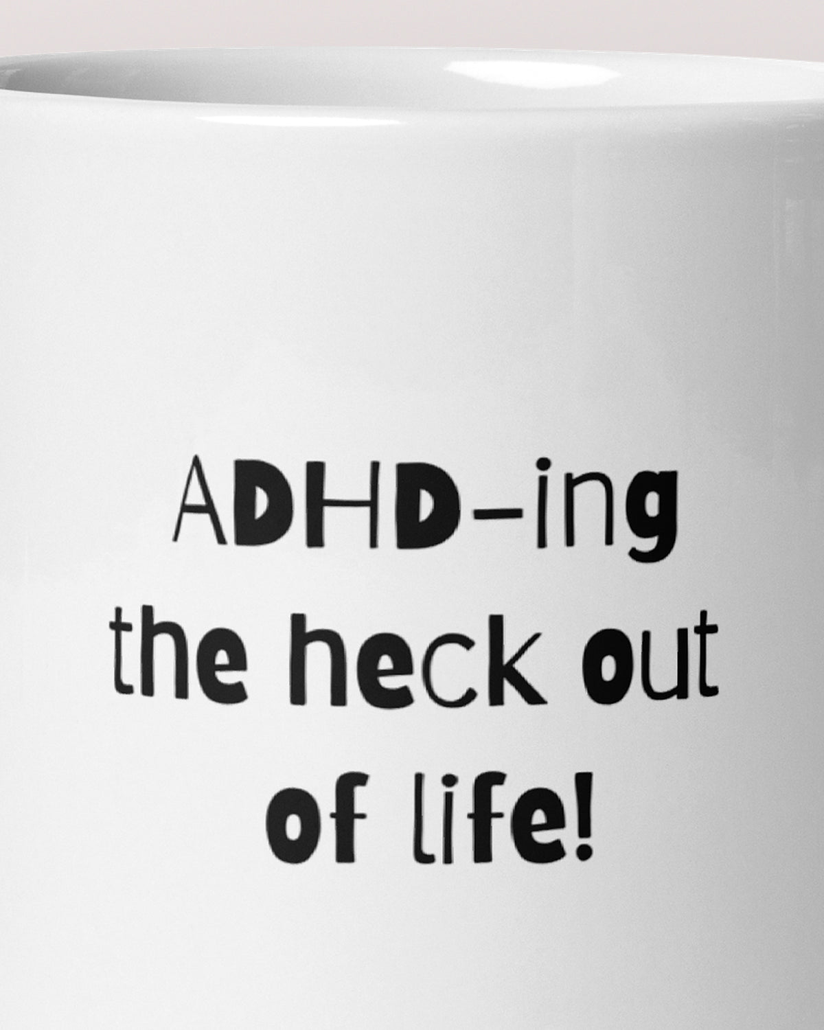 Close-up of the "ADHD-ing the Heck Out of Life" wording