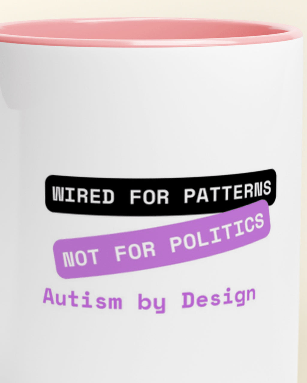 Close-up of the "By Design (Autism) — Wired for Patterns" wording
