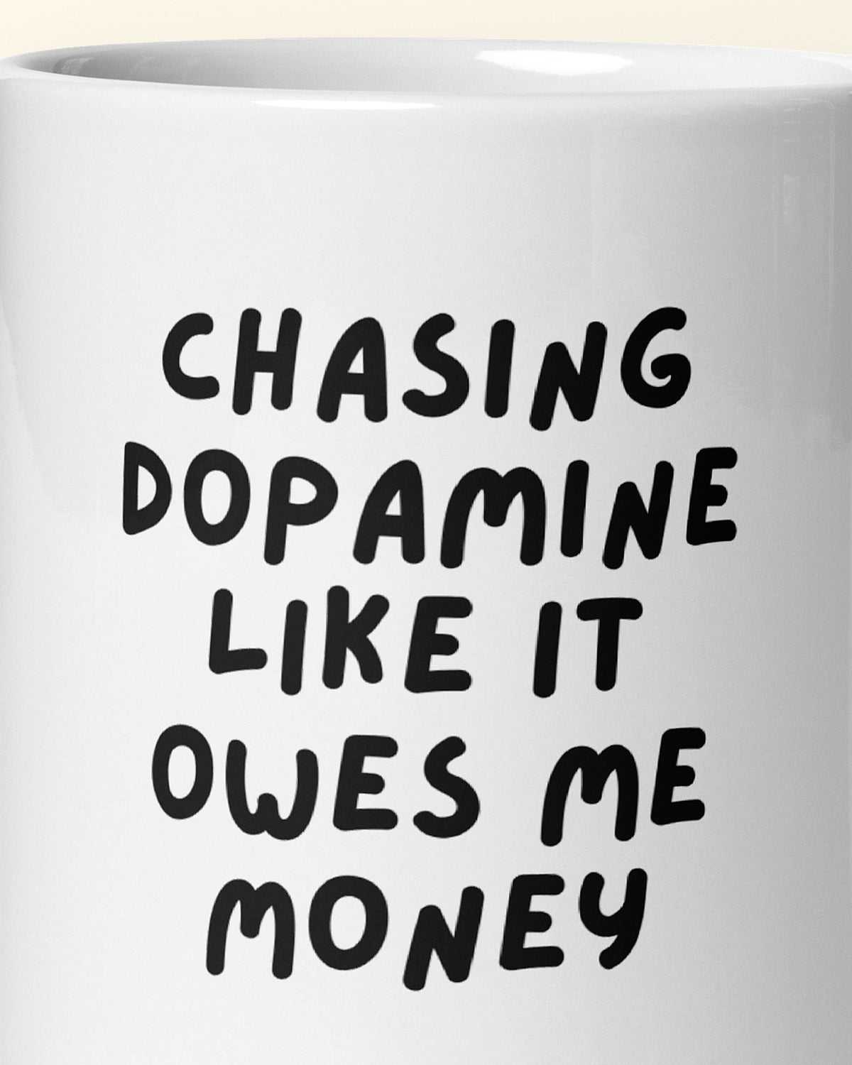 Close-up of the "Chasing Dopamine Like It Owes Me Money" wording