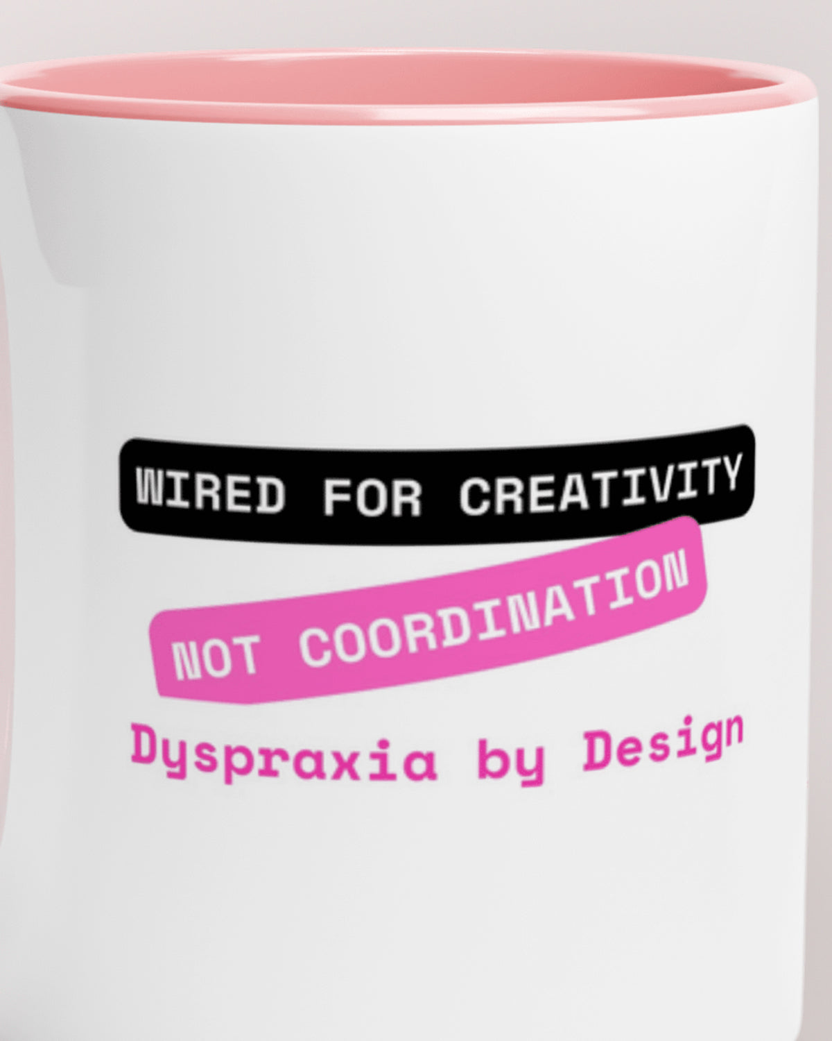 Close-up of the "Creativity not Coordination (Dyspraxia)" wording