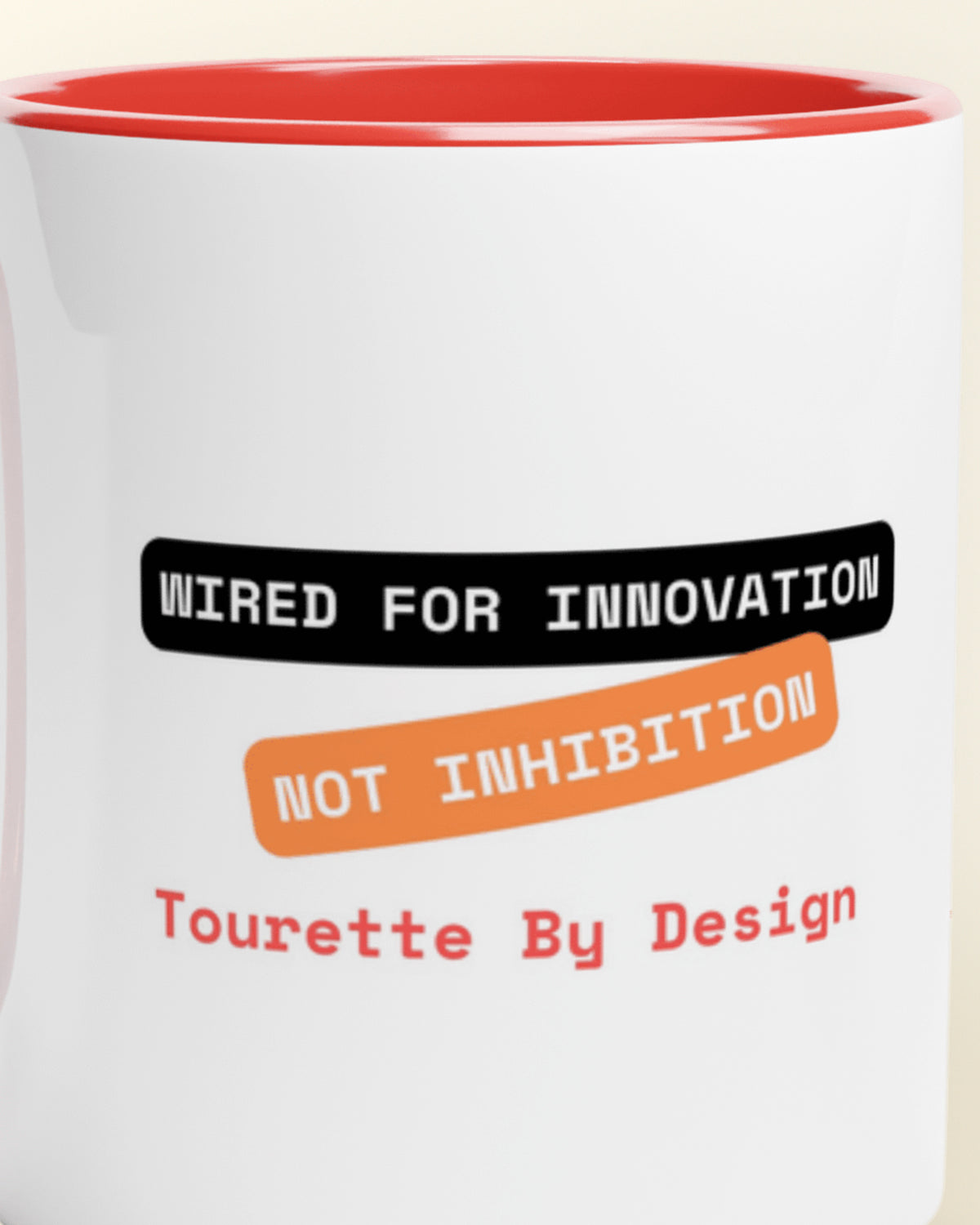 Close-up of the "Innovation not Inhibition (Tourette)" wording