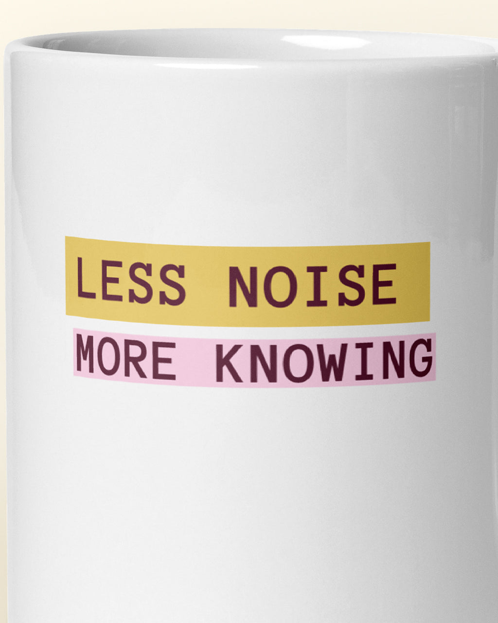 Close-up of the "Less Noise, More Knowing" wording