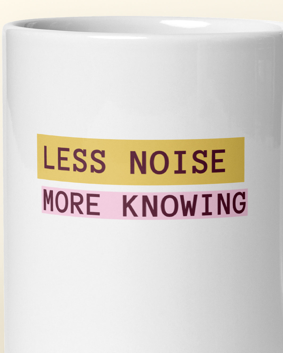 Close-up of the "Less Noise, More Knowing" wording