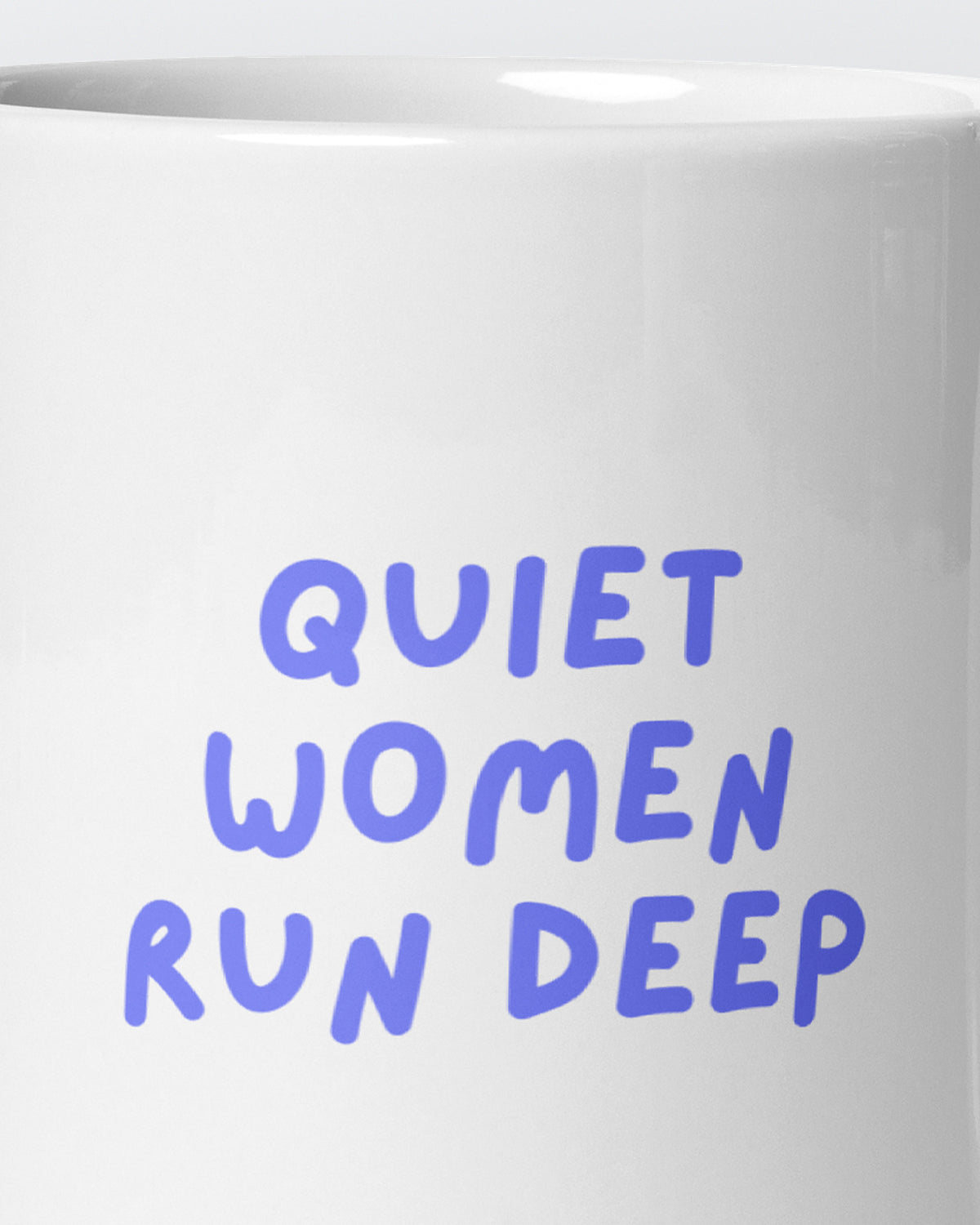 Close-up of the "Quiet Women Run Deep" wording