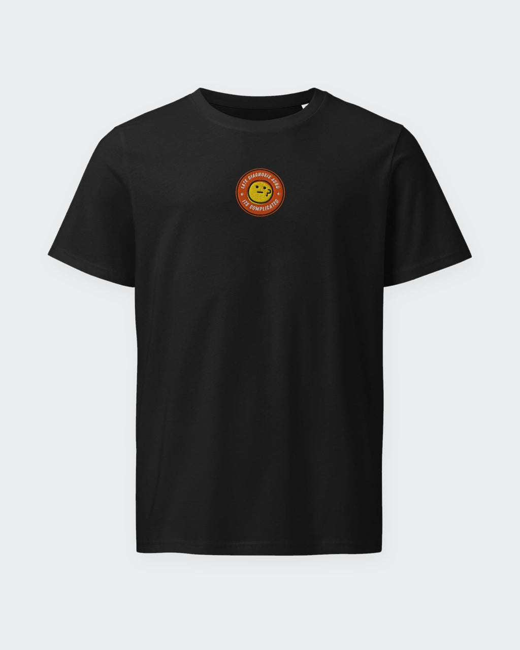 It's Complicated emoji (ADHD) organic embroidered badge tee in Black, laid flat