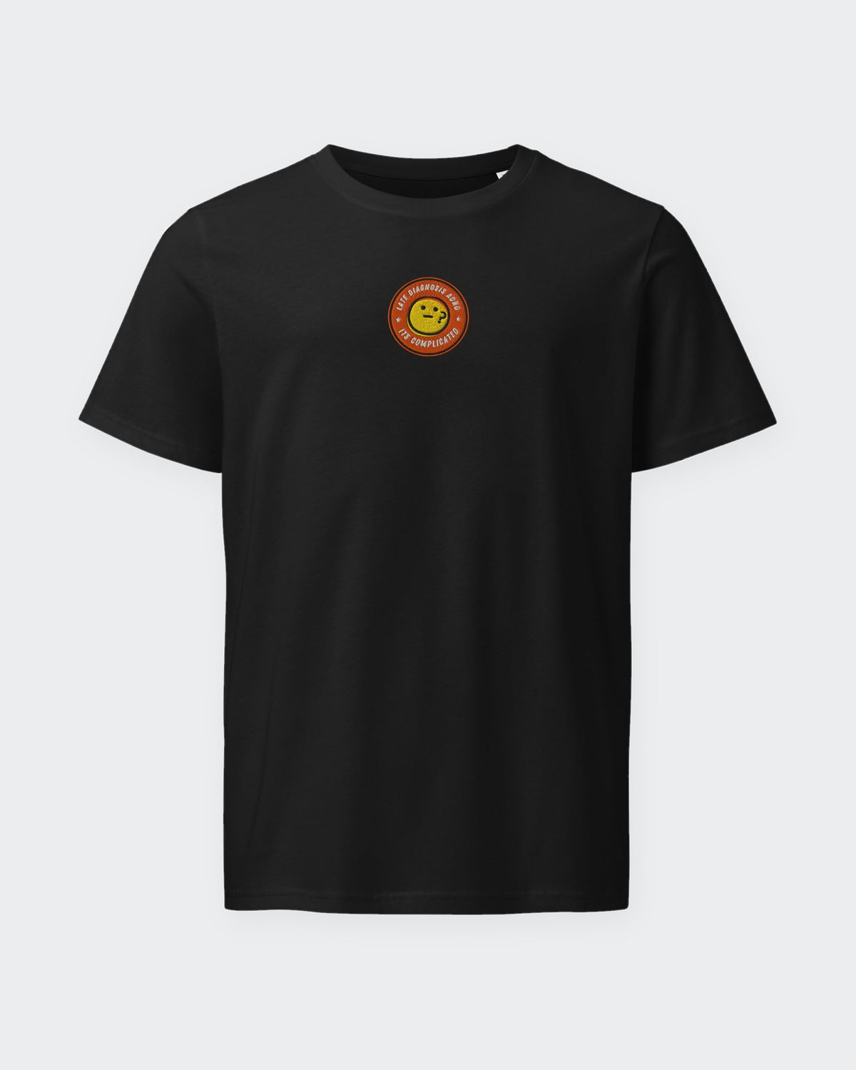It's Complicated emoji (ADHD) organic embroidered badge tee in Black, laid flat