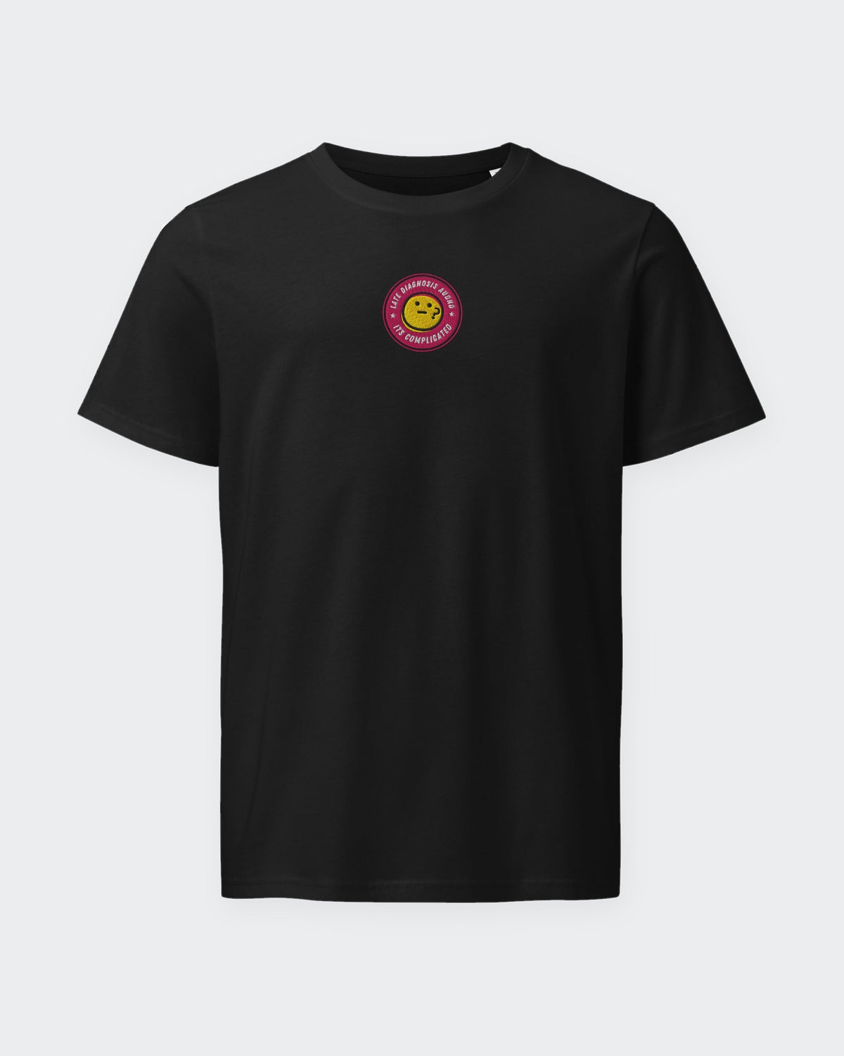 It's Complicated emoji (AuDHD) organic embroidered badge tee in Black, laid flat