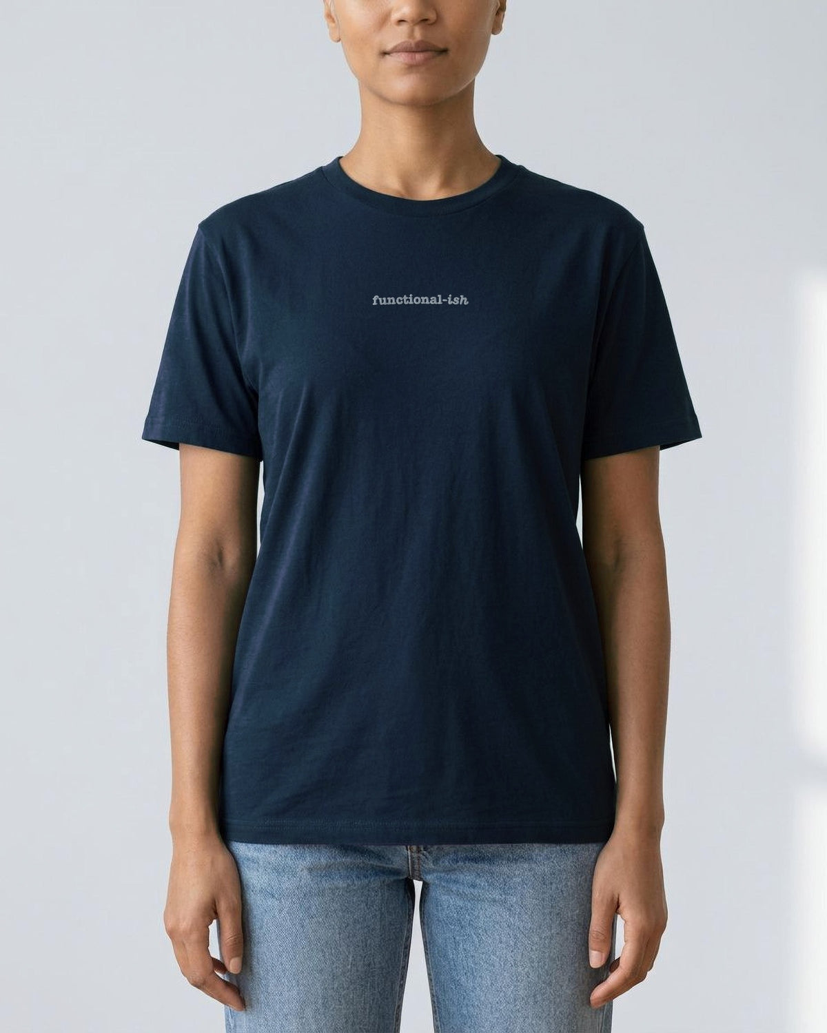 Functional-ish embroidered organic tee in French Navy, worn, front view