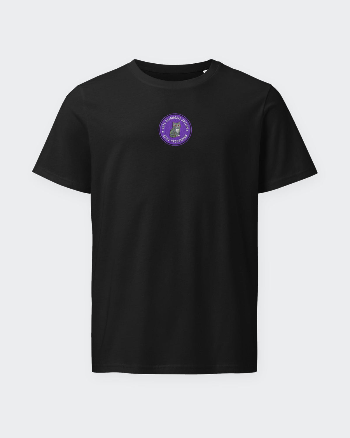 Still Processing organic embroidered badge tee in Black, laid flat