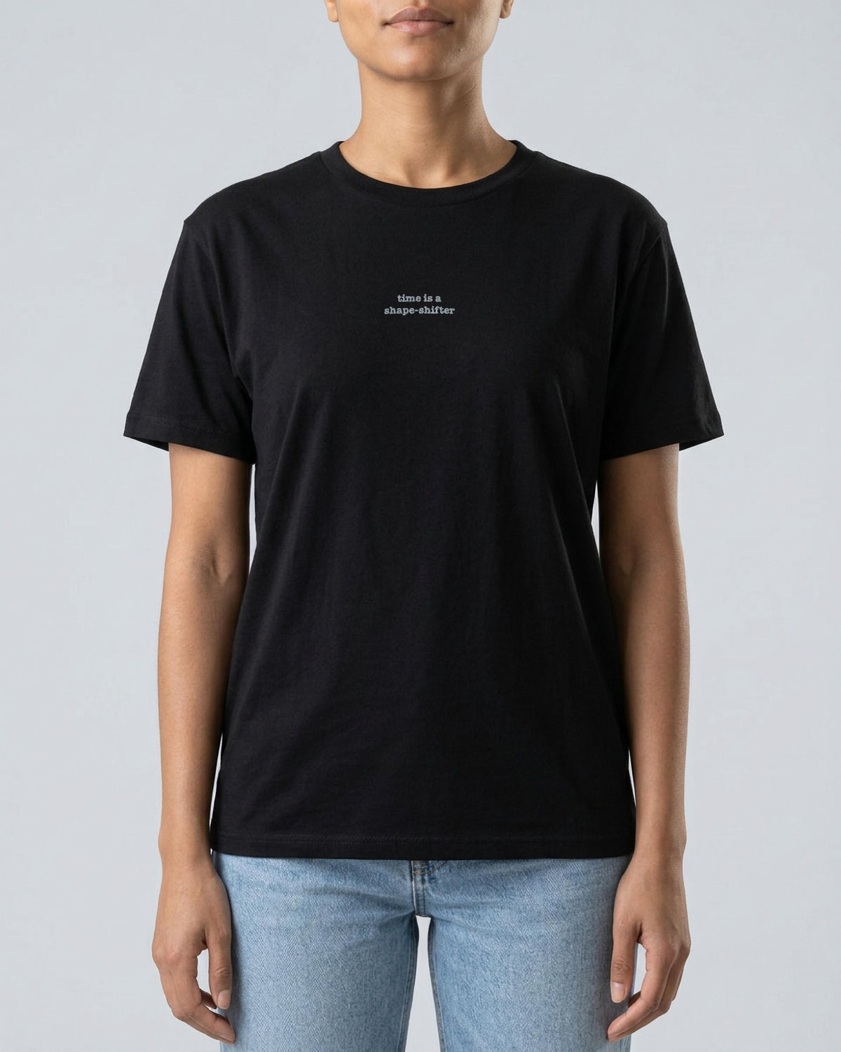 Time Is a Shape-Shifter embroidered organic tee in Black, worn, front view