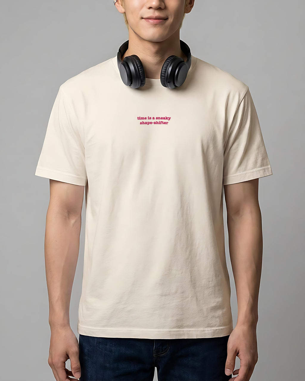 Time ... Sneaky Shape Shifter embroidered organic tee in Vintage White, worn, front view