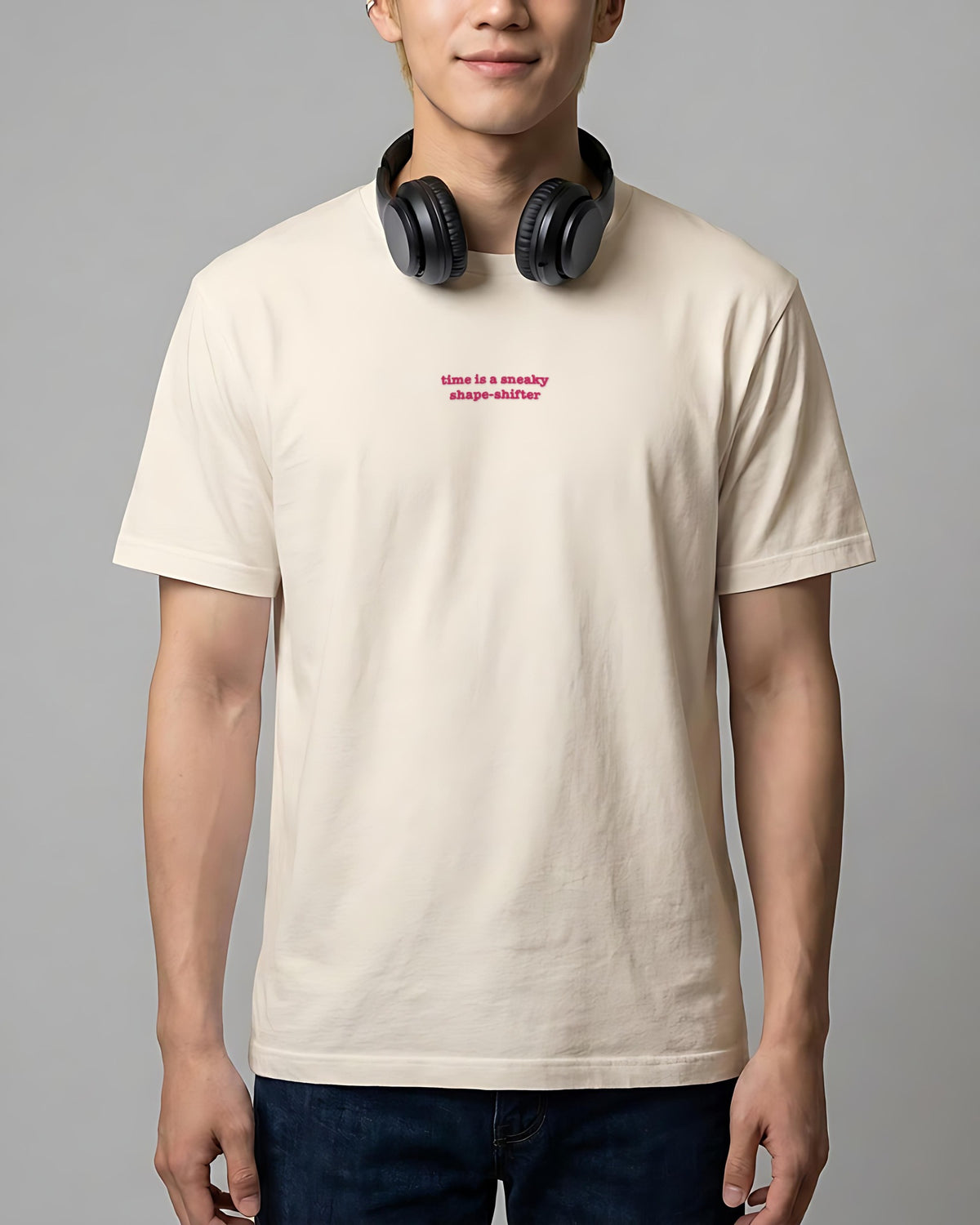 Time ... Sneaky Shape Shifter embroidered organic tee in Vintage White, worn, front view