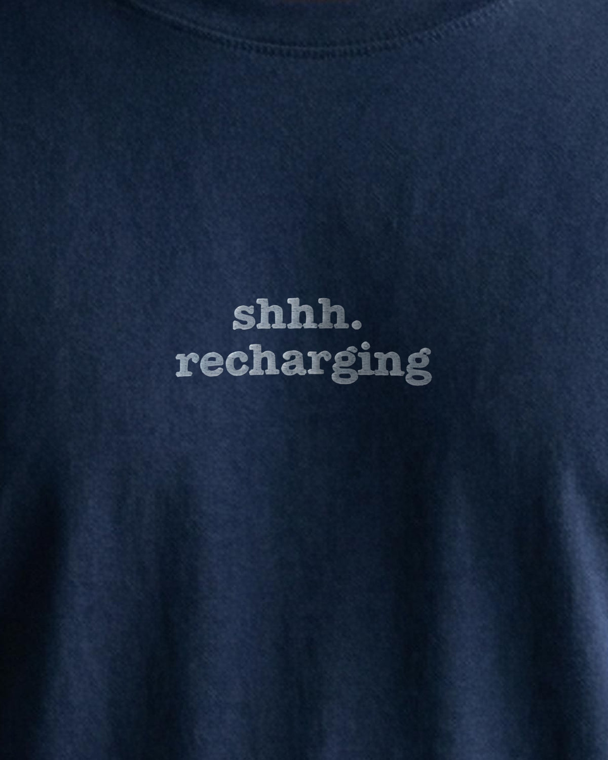 Shhh. Recharging embroidered organic tee in French Navy, worn