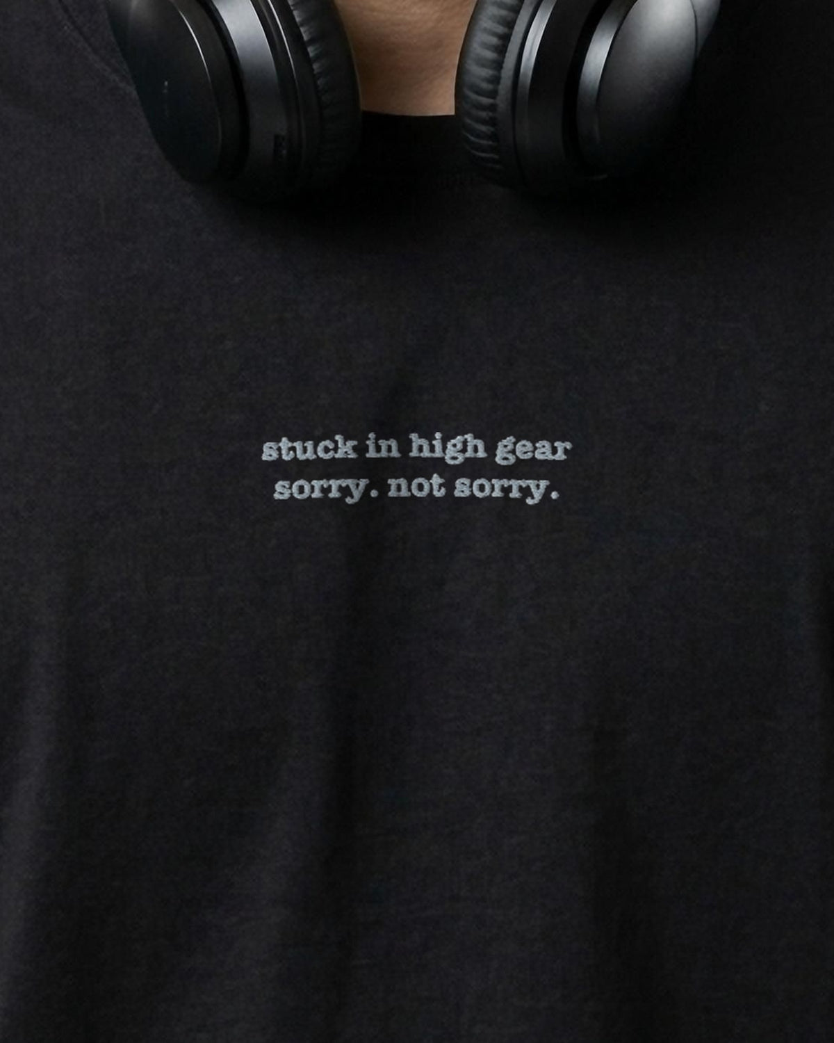 Stuck in High Gear embroidered organic tee in Black, worn