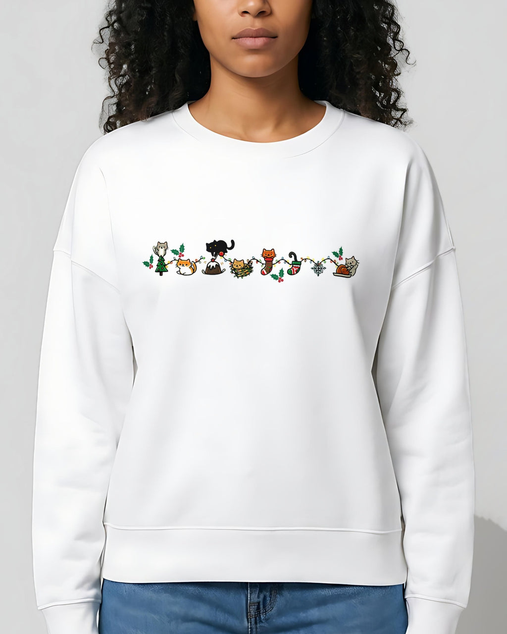 Cozy Catty Christmas women's organic sweatshirt in White, worn, front view