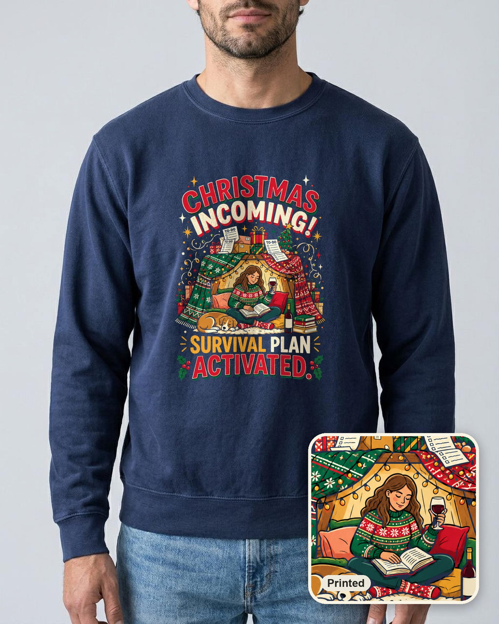 Christmas Incoming: Survival Plan Activated sweatshirt in True Navy, worn, with a close-up showing the design is printed