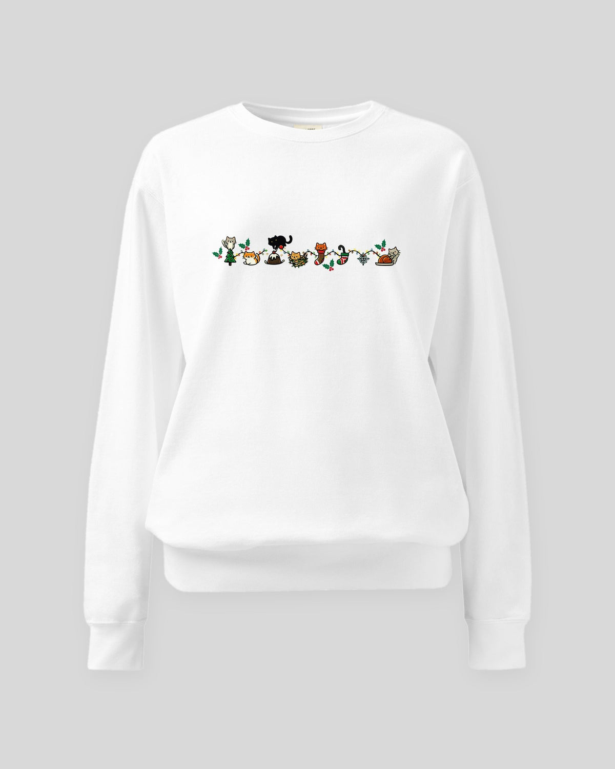 Cozy Catty Christmas garment-dyed sweatshirt in White, laid flat